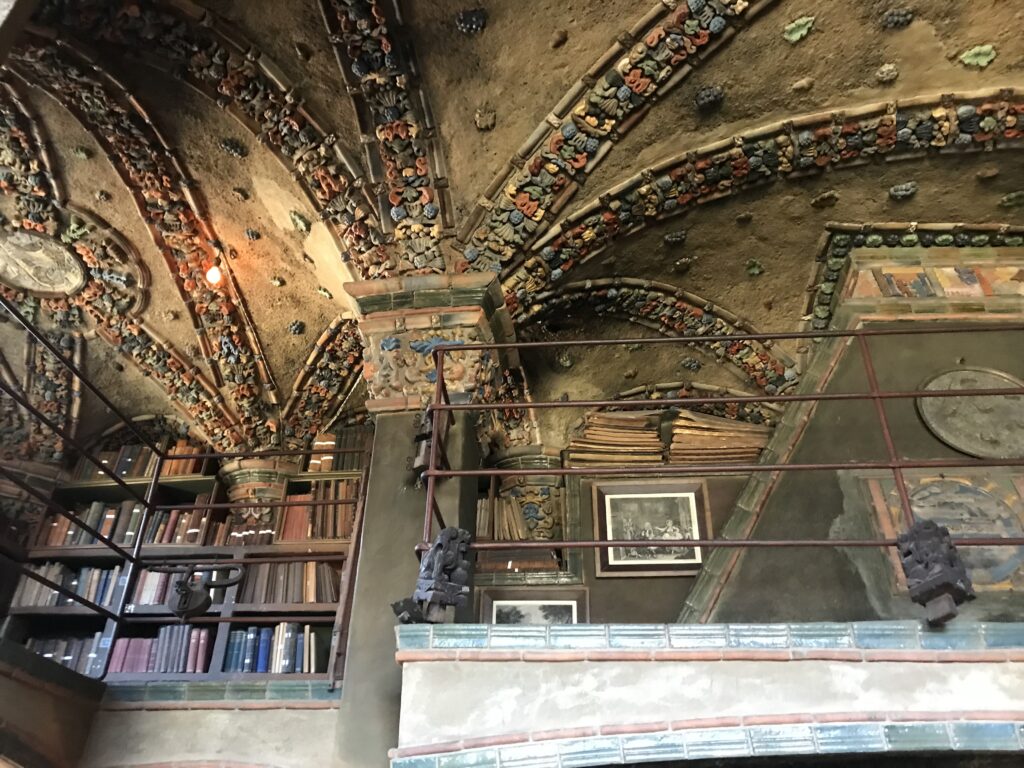 Decorative vaulted ceiling at Fonthill Castle featuring intricate colorful tilework and sculpted medallions