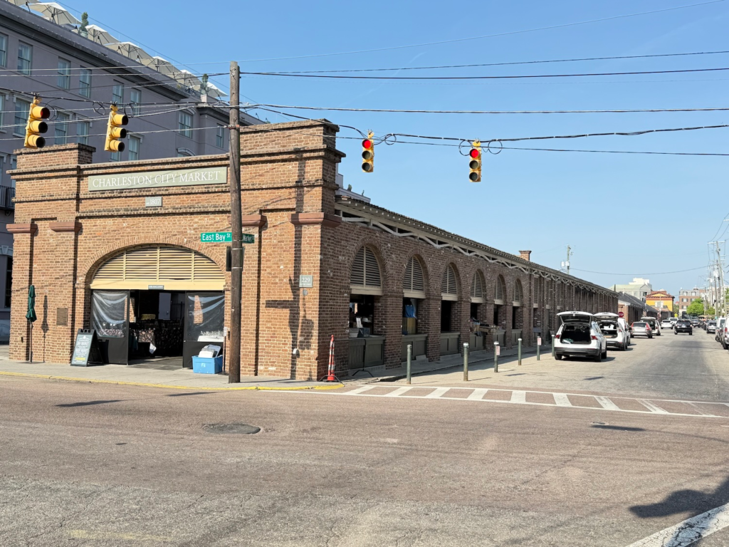 Exterior view of Charleston City Market on East Bay Street with historic brick building