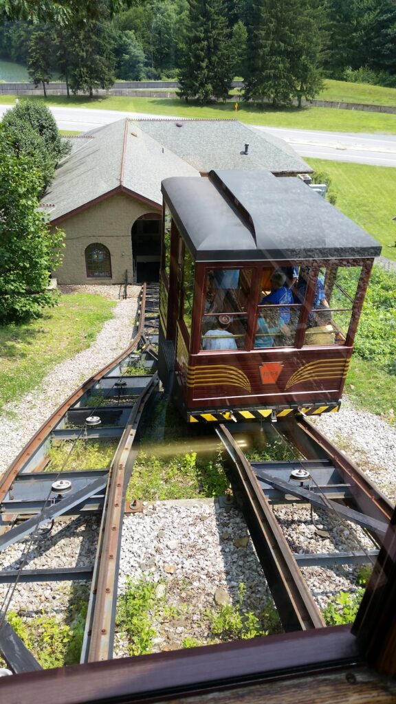 Incline plane funicular car descending the tracks at Horseshoe Curve in Altoona, Pennsylvania