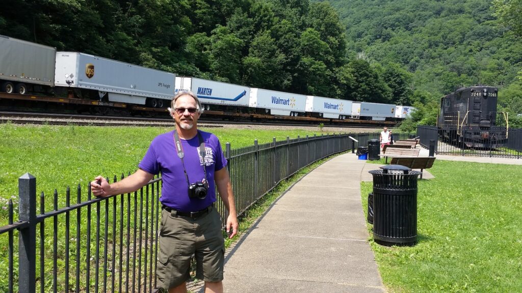 Standing along the walkway at Horseshoe Curve in Altoona, Pennsylvania as a freight train passes by