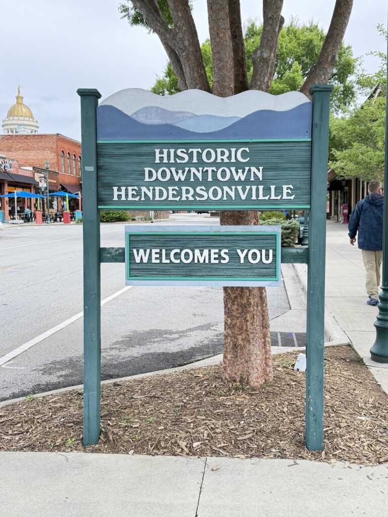 Historic Downtown Hendersonville welcome sign along Main Street in Hendersonville, North Carolina, welcoming visitors to the city's vibrant downtown district.