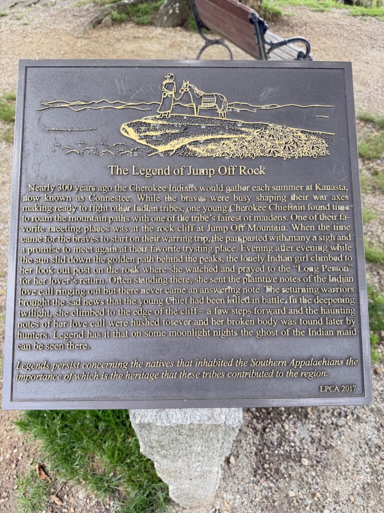 Historical marker at Jump Off Rock in Laurel Park, North Carolina, telling the Cherokee legend associated with the famous mountain overlook.