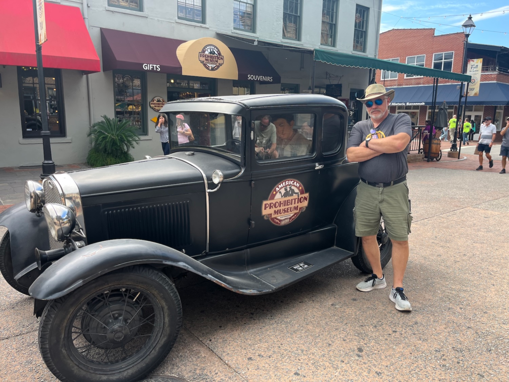 Vintage Prohibition Museum car parked in Savannah’s historic district