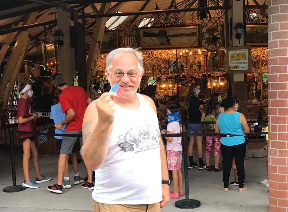 Visitor holding a game prize at Knoebels Amusement Resort in Elysburg, Pennsylvania.