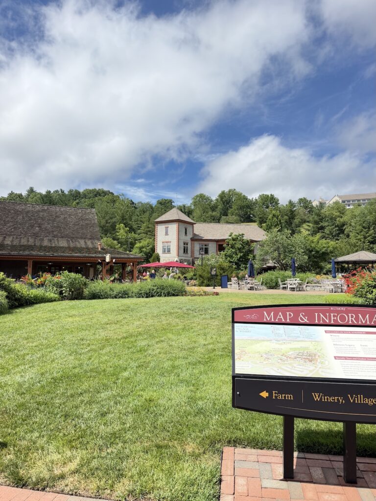 Green lawn and buildings at Antler Hill Village on the Biltmore Estate